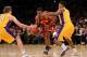 LOS ANGELES, CA - JANUARY 13: Ramon Sessions #3 of the Cleveland Cavaliers drives between Darius Morris #1 and Troy Murphy #14 of the Los Angeles Lakers at Staples Center on January 13, 2012 in Los Angeles, California. The Lakers won 97-92. NOTE TO USER: User expressly acknowledges and agrees that, by downloading and or using this photograph, User is consenting to the terms and conditions of the Getty Images License Agreement. (Photo by Stephen Dunn/Getty Images)