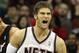 NEWARK, NJ - APRIL 03: Brook Lopez #11 of the New Jersey Nets reacts against the Miami Heat at the Prudential Center on April 3, 2011 in Newark, New Jersey.The Heat defeated the Nets 108-94.NOTE TO USER: User expressly acknowledges and agrees that, by downloading and/or using this Photograph, user is consenting to the terms and conditions of the Getty Images License Agreement. (Photo by Jim McIsaac/Getty Images)