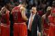 BOSTON, MA - JANUARY 13: Head coach Tom Thibodeau talks with his players during a time out in the fourth quarter against the Boston Celtics on January 13, 2012 at TD Garden in Boston, Massachusetts. The Chicago Bulls defeated the Boston Celtics 88-79. NOTE TO USER: User expressly acknowledges and agrees that, by downloading and or using this photograph, User is consenting to the terms and conditions of the Getty Images License Agreement. (Photo by Elsa/Getty Images)