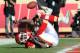 KANSAS CITY, MO - DECEMBER 24: Wide receiver Dwayne Bowe #82 of the Kansas City Chiefs drops a potential touchdown against the Oakland Raiders during the first half on December 24, 2011 at Arrowhead Stadium in Kansas City, Missouri. (Photo by Peter Aiken/Getty Images)