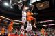 LOUISVILLE, KY - FEBRUARY 12: George Goode #0 of the Louisville Cardinals defends the shot of C.J. Fair #5 of the Syracuse Orange during the Big East Conference game against at the KFC Yum! Center on February 12, 2011 in Louisville, Kentucky. (Photo by Andy Lyons/Getty Images)