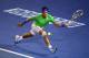 MELBOURNE, AUSTRALIA - JANUARY 29: Rafael Nadal of Spain plays a forehand in his men's final match against Novak Djokovic of Serbia during day fourteen of the 2012 Australian Open at Melbourne Park on January 29, 2012 in Melbourne, Australia. (Photo by Clive Brunskill/Getty Images)
