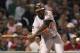 BOSTON, MA - SEPTEMBER 20: Vladimir Guerrero #27 of the Baltimore Orioles slaps the ball to right field where Josh Reddick #16 of the Boston Red Sox (not pictured) mishandled a fly ball in the third inning at Fenway Park September 20, 2011 in Boston, Massachusetts. (Photo by Jim Rogash/Getty Images)