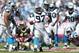 CHARLOTTE, NC - OCTOBER 9: Terrell McClain #97 of the Carolina Panthers celebrates after making a tackle against Darren Sproles #43 of the New Orleans Saints during the first half at Bank of America Stadium on October 9, 2011 in Charlotte, North Carolina. (Photo by Joe Robbins/Getty Images)