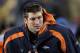 FOXBORO, MA - JANUARY 14: Tim Tebow #15 of the Denver Broncos looks on against the New England Patriots during their AFC Divisional Playoff Game at Gillette Stadium on January 14, 2012 in Foxboro, Massachusetts. (Photo by Jim Rogash/Getty Images)
