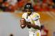 MIAMI GARDENS, FL - JANUARY 04: Geno Smith #12 of the West Virginia Mountaineers looks to pass against the Clemson Tigers during the Discover Orange Bowl at Sun Life Stadium on January 4, 2012 in Miami Gardens, Florida. (Photo by Streeter Lecka/Getty Images)