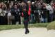 PEBBLE BEACH, CA - FEBRUARY 12: Tiger Woods reacts to his shot from a greenside bunker on the 12th hole during the final round of the AT&T Pebble Beach National Pro-Am at Pebble Beach Golf Links on February 12, 2012 in Pebble Beach, California. (Photo by Jeff Gross/Getty Images)