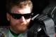DAYTONA BEACH, FL - FEBRUARY 18: Dale Earnhardt Jr., driver of the #88 Diet Mountain Dew/National Guard Chevrolet, sits in his car in the garage during practice for the NASCAR Sprint Cup Series Daytona 500 at Daytona International Speedway on February 18, 2012 in Daytona Beach, Florida. (Photo by Todd Warshaw/Getty Images for NASCAR)