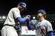 PHOENIX, AZ - SEPTEMBER 28: Matt Kemp #27 of the Los Angeles Dodgers high fives manager Don Mattingly after hitting a two run home run against the Arizona Diamondbacks during the seventh inning of the Major League Baseball game at Chase Field on September 28, 2011 in Phoenix, Arizona. (Photo by Christian Petersen/Getty Images)