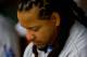 ST. LOUIS - JULY 18: Manny Ramirez #99 of the Los Angeles Dodgers sits in the dugout against the St. Louis Cardinals at Busch Stadium on July 18, 2010 in St. Louis, Missouri. (Photo by Dilip Vishwanat/Getty Images)