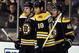 BOSTON, MA - JANUARY 05: David Krejci #46 of the Boston Bruins is congratulated by teammates Milan Lucic #117 and Nathan Horton #18 after Krejci scored in the second period against the Calgary Flames on January 5, 2012 at TD Garden in Boston, Massachusetts. (Photo by Elsa/Getty Images)