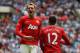 LONDON, ENGLAND - AUGUST 07: Phil Jones of Manchester United celebrates with goalscorer Chris Smalling during the FA Community Shield match sponsored by McDonald's between Manchester City and Manchester United at Wembley Stadium on August 7, 2011 in London, England. (Photo by Ian Walton/Getty Images)