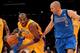 LOS ANGELES, CA - JANUARY 16: Kobe Bryant #24 of the Los Angeles Lakers drives against Jason Kidd#2 of the Dallas Mavericks at Staples Center on January 16, 2012 in Los Angeles, California. The Lakers won 73-70. NOTE TO USER: User expressly acknowledges and agrees that, by downloading and or using this photograph, User is consenting to the terms and conditions of the Getty Images License Agreement. (Photo by Stephen Dunn/Getty Images)