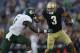 SOUTH BEND, IN - SEPTEMBER 03: Michael Floyd #3 of the Notre Dame Fighting Irish fights off Jon Lejiste #8 of the University of South Florida Bulls at Notre Dame Stadium on September 3, 2011 in South Bend, Indiana. (Photo by Jonathan Daniel/Getty Images)