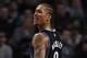 BOSTON, MA - JANUARY 03: Michael Beasley #8 of the Minnesota Timberwolves reacts to a foul called against him in the second half against the Boston Celtics on January 3, 2011 at the TD Garden in Boston, Massachusetts. The Celtics defeated the Timberwolves 96-93. NOTE TO USER: User expressly acknowledges and agrees that, by downloading and/or using this Photograph, User is consenting to the terms and conditions of the Getty Images License Agreement. (Photo by Elsa/Getty Images)