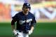 MILWAUKEE, WI - OCTOBER 09: Ryan Braun #8 of the Milwaukee Brewers rounds the base on his 2-run home run in the bottom of the first inning against the St. Louis Cardinals during Game one of the National League Championship Series at Miller Park on October 9, 2011 in Milwaukee, Wisconsin. (Photo by Jim Prisching-Pool/Getty Images)