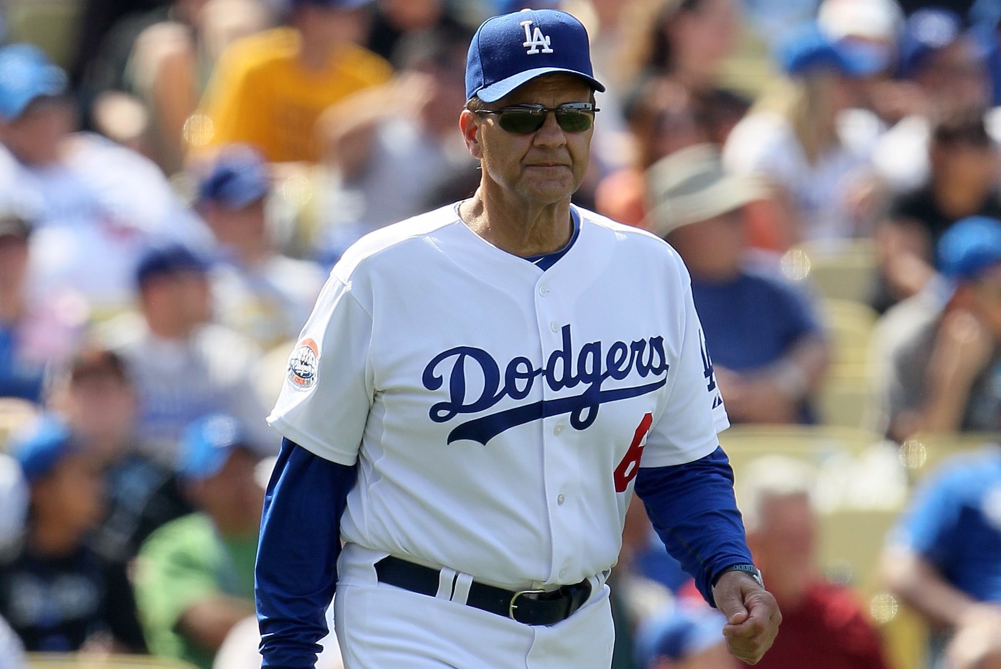 Joe Torre resigns from MLB, part of group trying to buy Los