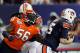 ATLANTA, GA - DECEMBER 31: Cam Johnson #56 of the Virginia Cavaliers against Clint Moseley #15 of the Auburn Tigers during the 2011 Chick Fil-A Bowl at Georgia Dome on December 31, 2011 in Atlanta, Georgia. (Photo by Kevin C. Cox/Getty Images)