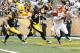 PITTSBURGH, PA - DECEMBER 04: Andy Dalton #14 of the Cincinnati Bengals is hurried in the endzone by Brett Keisel #99 and James Farrior #51 of the Pittsburgh Steelers during the game on December 4, 2011 at Heinz Field in Pittsburgh, Pennsylvania. (Photo by Jared Wickerham/Getty Images)