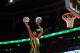 ORLANDO, FL - FEBRUARY 25: Jeremy Evans of the UTah Jazz jumps over jumps over teammate Gordon Haywood as he dunks two basketballs during the Sprite Slam Dunk Contest part of 2012 NBA All-Star Weekend at Amway Center on February 25, 2012 in Orlando, Florida. NOTE TO USER: User expressly acknowledges and agrees that, by downloading and or using this photograph, User is consenting to the terms and conditions of the Getty Images License Agreement. (Photo by Mike Ehrmann/Getty Images)