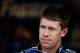 DAYTONA BEACH, FL - FEBRUARY 24: Carl Edwards, driver of the #99 Fastenal Ford, stands in the garage during practice for the NASCAR Sprint Cup Series Daytona 500 at Daytona International Speedway on February 24, 2012 in Daytona Beach, Florida. (Photo by Streeter Lecka/Getty Images)