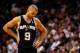 MIAMI, FL - JANUARY 17: Tony Parker #9 of the San Antonio Spurs looks on during a game against the Miami Heat at American Airlines Arena on January 17, 2012 in Miami, Florida. NOTE TO USER: User expressly acknowledges and agrees that, by downloading and/or using this Photograph, User is consenting to the terms and conditions of the Getty Images License Agreement. (Photo by Mike Ehrmann/Getty Images)