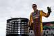 DAYTONA BEACH, FL - FEBRUARY 26: Kyle Busch, driver of the #18 M&M's Brown Toyota, waves to fans during driver introductions prior to the start of the NASCAR Sprint Cup Series Daytona 500 at Daytona International Speedway on February 26, 2012 in Daytona Beach, Florida. (Photo by Jerry Markland/Getty Images for NASCAR)