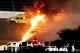 DAYTONA BEACH, FL - FEBRUARY 27: A jet dryer bursts into flames after being hit by Juan Pablo Montoya, driver of the #42 Target Chevrolet, under caution during the NASCAR Sprint Cup Series Daytona 500 at Daytona International Speedway on February 27, 2012 in Daytona Beach, Florida. (Photo by Streeter Lecka/Getty Images)