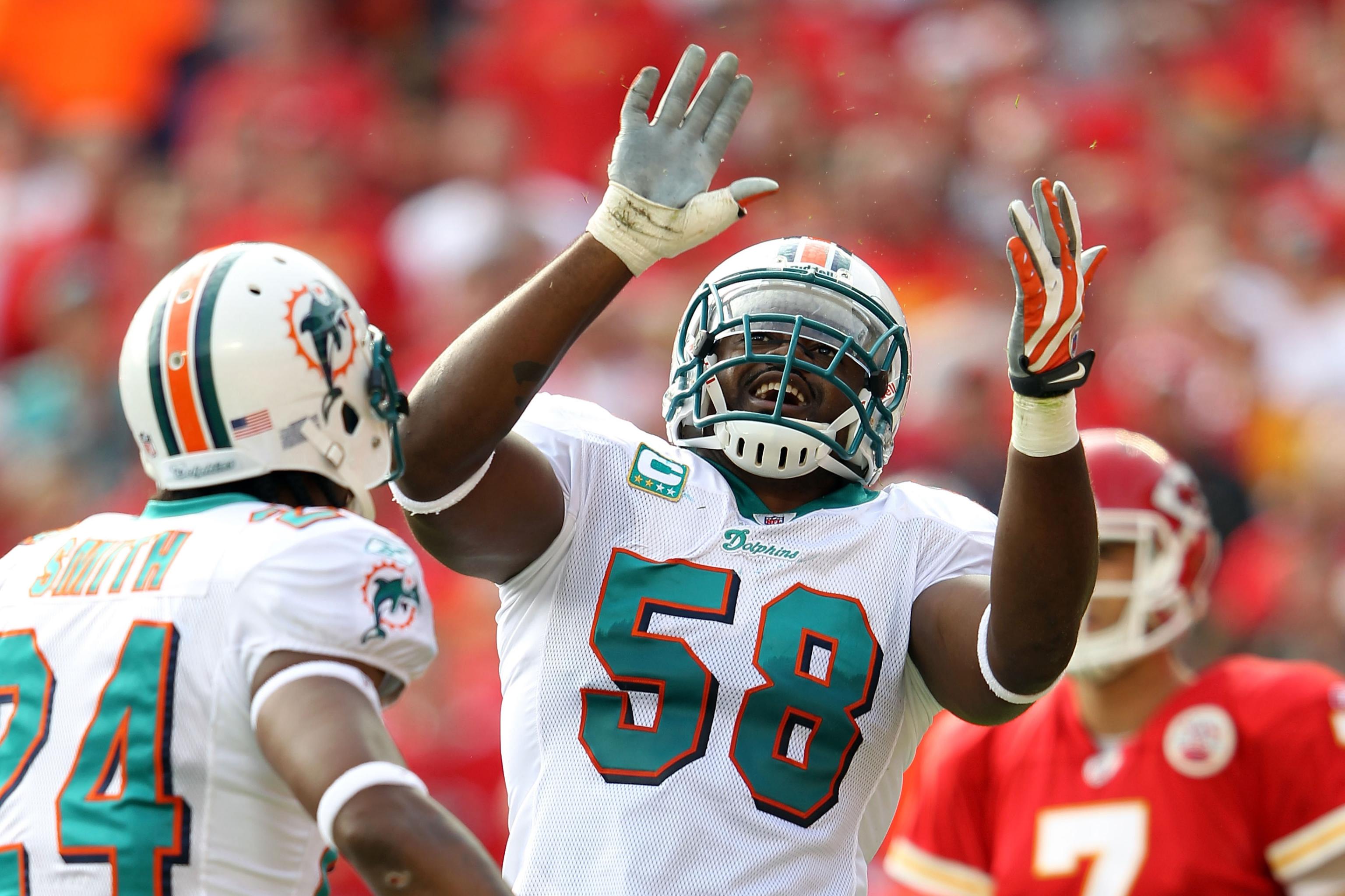 Miami Dolphins linebacker Karlos Dansby, who is playing great now, concedes  that he reported to camp overweight