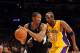 LOS ANGELES, CA - FEBRUARY 29: Wesley Johnson #4 of the Minnesota Timberwolves keeps the ball away from Kobe Bryant #24 of the Los Angeles Lakers during a 105-84 Laker win at Staples Center on February 29, 2012 in Los Angeles, California. NOTE TO USER: User expressly acknowledges and agrees that, by downloading and or using this photograph, User is consenting to the terms and conditions of the Getty Images License Agreement. (Photo by Harry How/Getty Images)