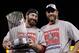 ST LOUIS, MO - OCTOBER 28: (L-R) Jason Motte #30 and Lance Berkman #12 of the St. Louis Cardinals hold up the World Series trophy after defeating the Texas Rangers 6-2 in Game Seven of the MLB World Series at Busch Stadium on October 28, 2011 in St Louis, Missouri. (Photo by Charlie Riedle-Pool/Getty Images)