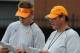 OC Jim Chaney and QB coach Darin Hinshaw confer with each other during spring practice in 2011.
