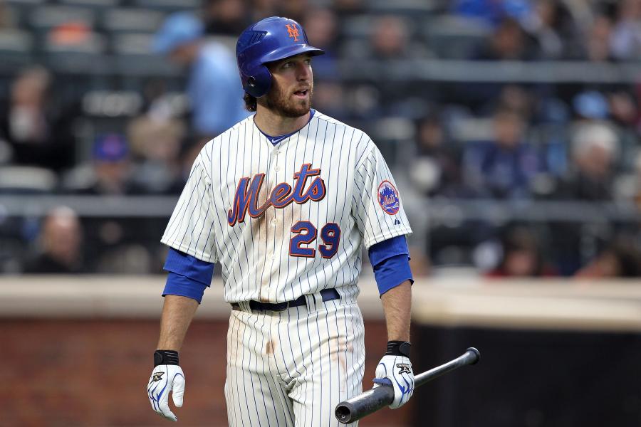 New York Mets infielder Ike Davis (#29) high fives outfielder Jeff