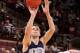 COLUMBUS, OH - DECEMBER 28: John Shurna #24 of the Northwestern Wildcats attempts a shot against the Ohio State Buckeyes in the second half on December 28, 2011 at Value City Arena in Columbus, Ohio. Ohio State defeated Northwestern 87-54. (Photo by Jamie Sabau/Getty Images)