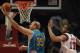 CHICAGO, IL - FEBRUARY 28: Chris Kaman #35 of the New Orleans Hornets puts up a shot past Joakim Noah #13 of the Chicago Bulls at the United Center on February 28, 2012 in Chicago, Illinois. NOTE TO USER: User expressly acknowledges and agrees that, by downloading and or using this photograph, User is consenting to the terms and conditions of the Getty Images License Agreement. (Photo by Jonathan Daniel/Getty Images)