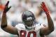 HOUSTON - SEPTEMBER 11: Mario Williams #90 of the Houston Texans gets the crowd hyped up during a football game between the Indianapolis Colts and the Houston Texans at Reliant Stadium on September 11, 2011 in Houston, Texas. (Photo by Bob Levey/Getty Images)