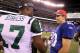 EAST RUTHERFORD, NJ - AUGUST 29: Eli Manning #10 of the New York Giants greets Plaxico Burress #17 of the New York Jets after their pre season game on August 29, 2011 at MetLife Stadium in East Rutherford, New Jersey. (Photo by Jim McIsaac/Getty Images)