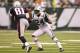 EAST RUTHERFORD, NJ - SEPTEMBER 19: Darrelle Revis #24 of the New York Jets defends against Randy Moss #81 of the New England Patriots during their game on September 19, 2010 at the New Meadowlands Stadium in East Rutherford, New Jersey. (Photo by Al Bello/Getty Images)