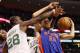 BOSTON, MA - FEBRUARY 15: Tayshaun Prince #22 of the Detroit Pistons tries to keep the ball as Mickael Pietrus #28 of the Boston Celtics defends on February 15, 2012 at TD Garden in Boston, Massachusetts. The Detroit Pistons defeated the Boston Celtics 98-88. NOTE TO USER: User expressly acknowledges and agrees that, by downloading and or using this photograph, User is consenting to the terms and conditions of the Getty Images License Agreement. (Photo by Elsa/Getty Images)