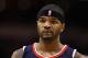 PHOENIX, AZ - FEBRUARY 15: Josh Smith #5 of the Atlanta Hawks during the NBA game against the Phoenix Suns at US Airways Center on February 15, 2012 in Phoenix, Arizona. The Hawks defeated the Suns 101-99. NOTE TO USER: User expressly acknowledges and agrees that, by downloading and or using this photograph, User is consenting to the terms and conditions of the Getty Images License Agreement. (Photo by Christian Petersen/Getty Images)
