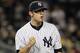 NEW YORK, NY - SEPTEMBER 21: David Robertson #30 of the New York Yankees celebrates after getting out of an eighth inning jam against the Tampa Bay Rays on September 21, 2011 at Yankee Stadium in the Bronx borough of New York City. (Photo by Jim McIsaac/Getty Images)