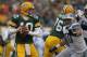 GREEN BAY, WI - JANUARY 01: Matt Flynn #10 of the Green Bay Packerslooks for a receiver as Ndamukong Suh #90 of the Detroit Lions rushes at Lambeau Field on January 1, 2012 in Green Bay, Wisconsin. The Packers defeated the Lions 45-41. (Photo by Jonathan Daniel/Getty Images)