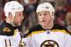 GLENDALE, AZ - DECEMBER 28: Shawn Thornton #22 (R) of the Boston Bruins talks with Gregory Campbell #11 during the NHL game against the Phoenix Coyotes at Jobing.com Arena on December 28, 2011 in Glendale, Arizona. The Bruins defeated the Coyotes 2-1 in overtime. (Photo by Christian Petersen/Getty Images)
