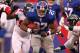 EAST RUTHERFORD, NJ - JANUARY 08: Brandon Jacobs #27 of the New York Giants runs the ball against the Atlanta Falcons during their NFC Wild Card Playoff game at MetLife Stadium on January 8, 2012 in East Rutherford, New Jersey. (Photo by Al Bello/Getty Images)