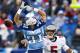 NASHVILLE, TN - NOVEMBER 27: Quarterback Josh Freeman #5 of the Tampa Bay Buccaneers throws a pass around Cortland Finnegan #31 of the Tennessee Titans at LP Field on November 27, 2011 in Nashville, Tennessee. (Photo by Wesley Hitt/Getty Images)