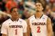 GREENSBORO, NC - MARCH 10: Jontel Evans #1 and Mustapha Farrakhan of the Virginia Cavaliers look on during the second half of the game against the Miami Hurricanes in the first round of the 2011 ACC men's basketball tournament at the Greensboro Coliseum on March 10, 2011 in Greensboro, North Carolina. (Photo by Streeter Lecka/Getty Images)