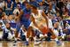 NEW ORLEANS, LA - MARCH 10: Doron Lamb #20 of the Kentucky Wildcats controls the ball against the defense of Erving Walker #11 of the Florida Gators in the second half during the semifinals of the SEC Men's Basketball Tournament at New Orleans Arena on March 10, 2012 in New Orleans, Louisiana. (Photo by Chris Graythen/Getty Images)