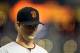 PHOENIX, AZ - SEPTEMBER 23: Starting pitcher Matt Cain #18 of the San Francisco Giants walks back to the dugout during the Major League Baseball game against the Arizona Diamondbacks at Chase Field on September 23, 2011 in Phoenix, Arizona. (Photo by Christian Petersen/Getty Images)
