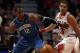 CHICAGO, IL - DECEMBER 01: Dwight Howard #12 of the Orlando Magic and Joakim Noah #13 of the Chicago Bulls moves toward a loose ball at the United Center on December 1, 2010 in Chicago, Illinois. The Magic defeated the Bulls 107-78. NOTE TO USER: User expressly acknowledges and agrees that, by downloading and/or using this Photograph, User is consenting to the terms and conditions of the Getty Images License Agreement. (Photo by Jonathan Daniel/Getty Images)