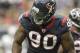 HOUSTON - OCTOBER 09: Outside linebacker Mario Williams #90 of the Houston Texans reacts after a big defensive stop in the first quarter against the Oakland Raiders at Reliant Stadium on October 9, 2011 in Houston, Texas. (Photo by Bob Levey/Getty Images)